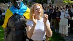 Zelensky's removal of popular defence minister sparks protests in Ukraine