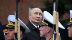 Putin denounces Nato at scaled back Victory Day parade