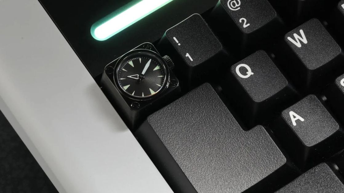  Here's a keycap that's also a watch, for the discerning gamer 