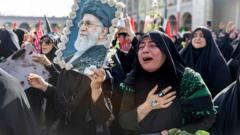 Iran's supreme leader absent as senior officials attend ayatollah's funeral