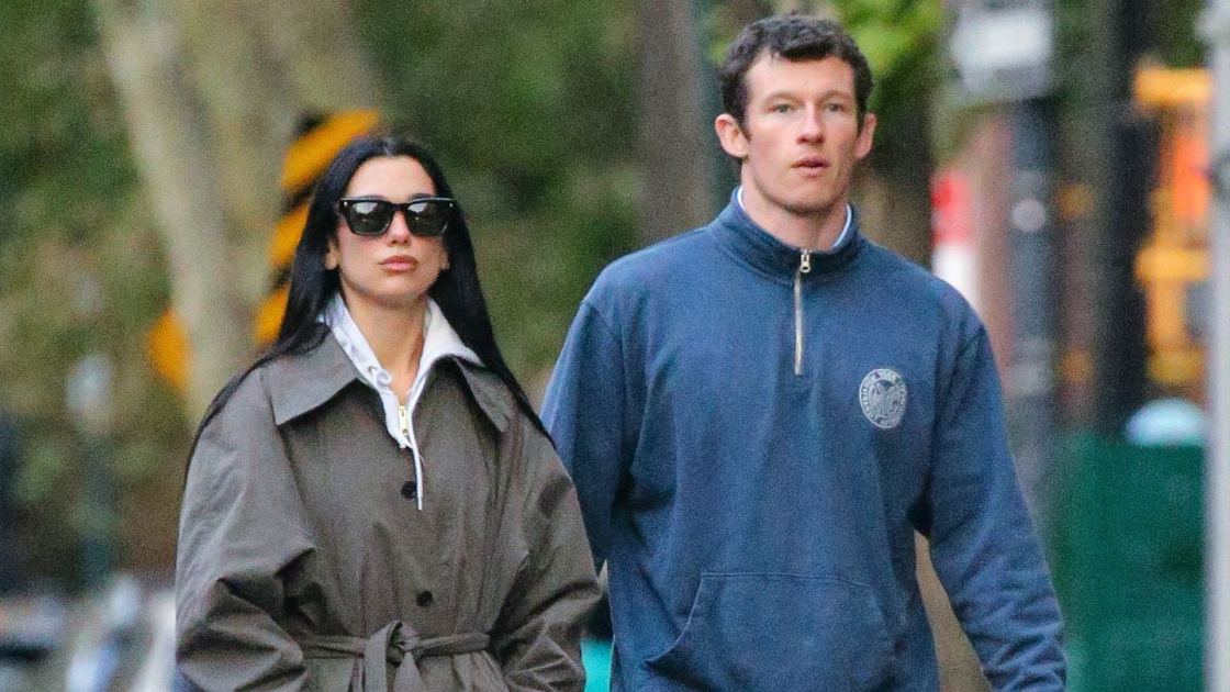  No, Not Boots—Maxi Coats Look Just as Chic With This Comfortable Trainer Trend 