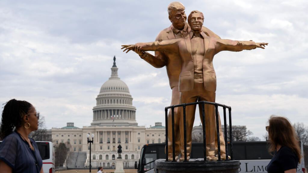 Week in pictures: Trouble in the Strait of Hormuz, Iran’s new leader and a Trump-Epstein statue