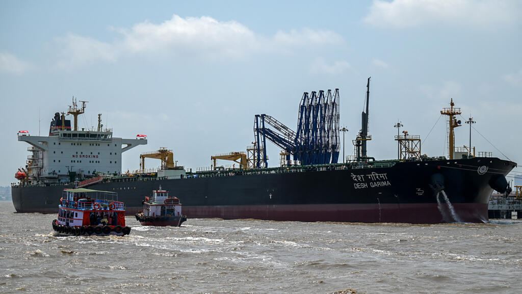 Mideast live: Oil tanker struck by projectile in Strait of Hormuz off Oman
