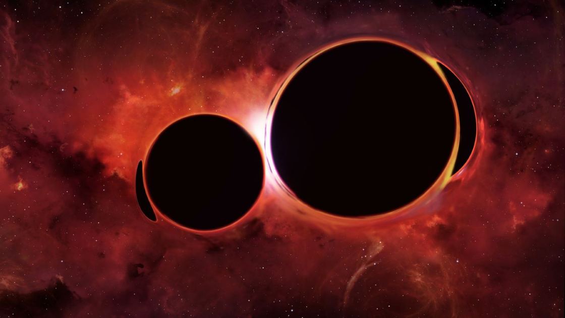  2 supermassive black holes may collide 100 years from now ‪—‬ and Earth would feel it 