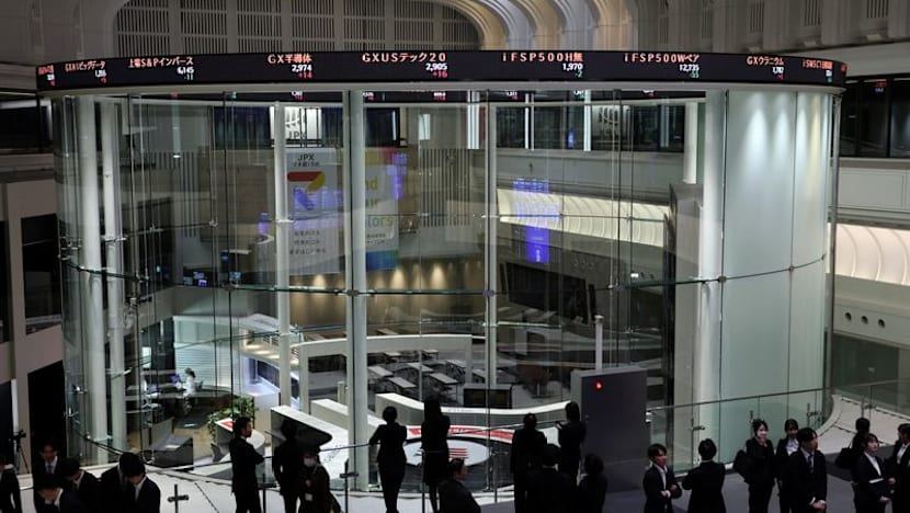 Japan's Nikkei hits record high as chip-related shares jump