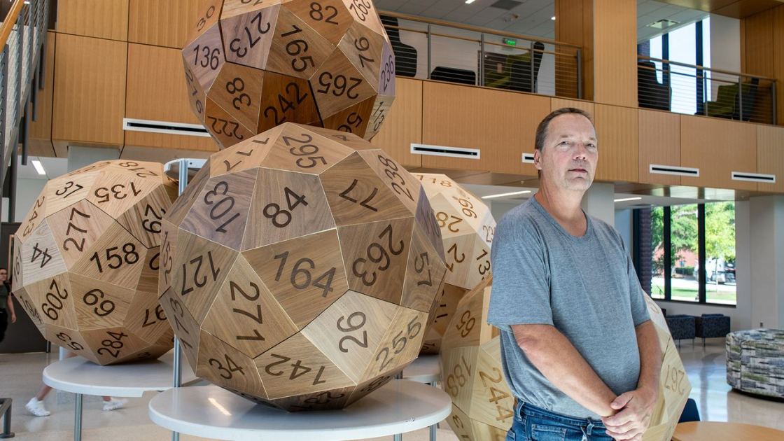  Mathematicians say these 60-sided dice are the fairest in the world. Designing them took 15 years. 