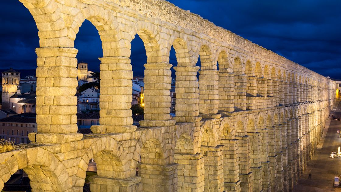  How did the Romans build their towering aqueducts? 