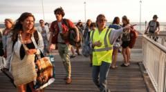 Tens of thousands evacuated from French tourist spot as wildfires spread