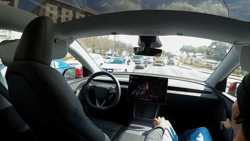 Tesla's once-bullish tone on robotaxis shifts  