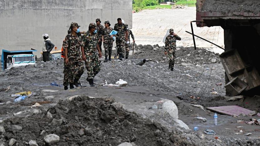 Rescuers continue grim search for Nepal flood survivor