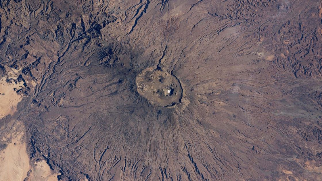 A surprising slab of salt shines at the summit of the Sahara's tallest peak — Earth from space 